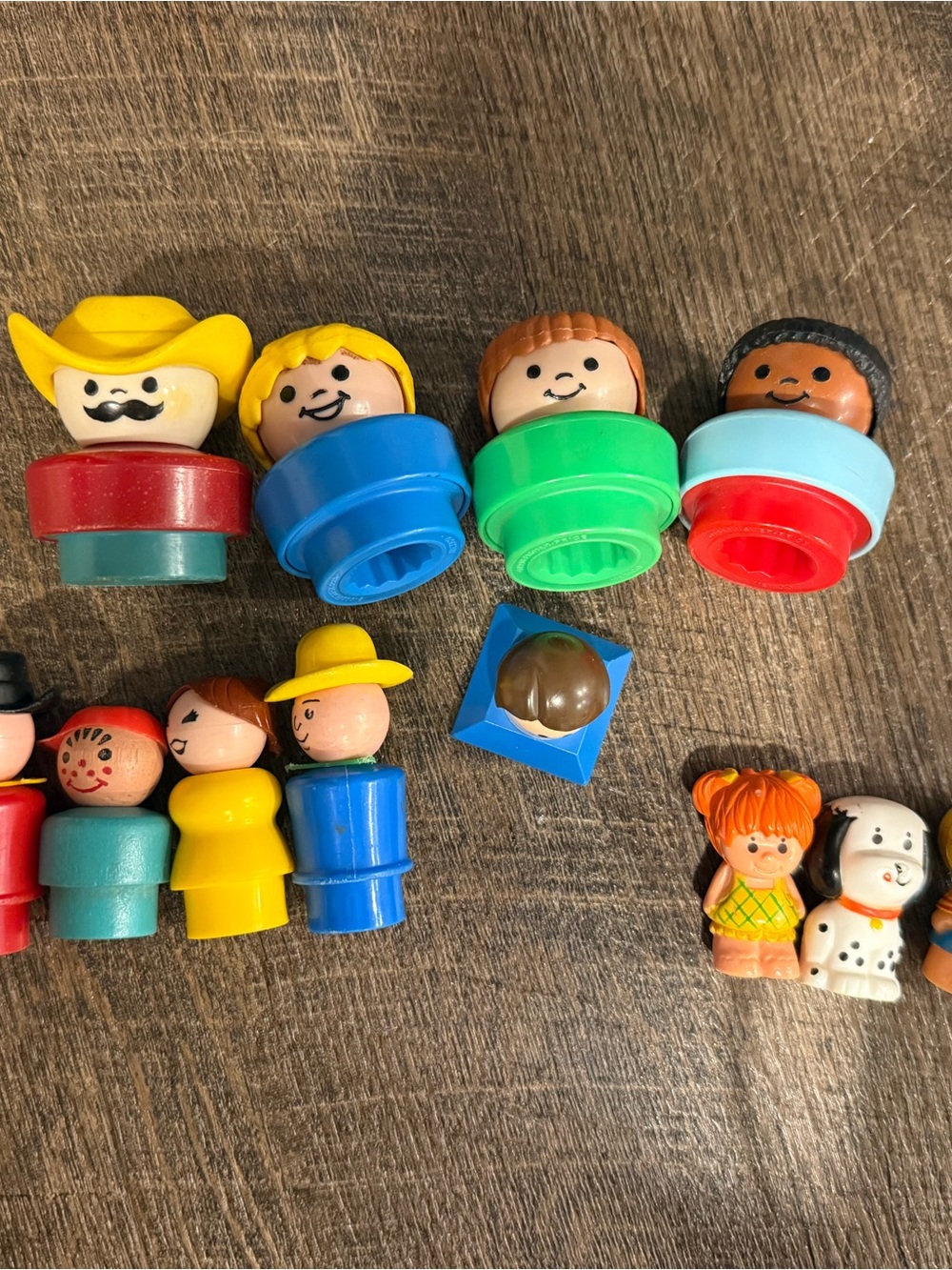 Fisher-Price Peg People Set with Bright Yellow, Blue, Green, Red, Brown